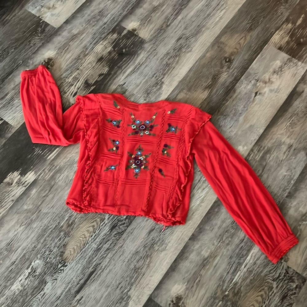 Free People embroidered top.
